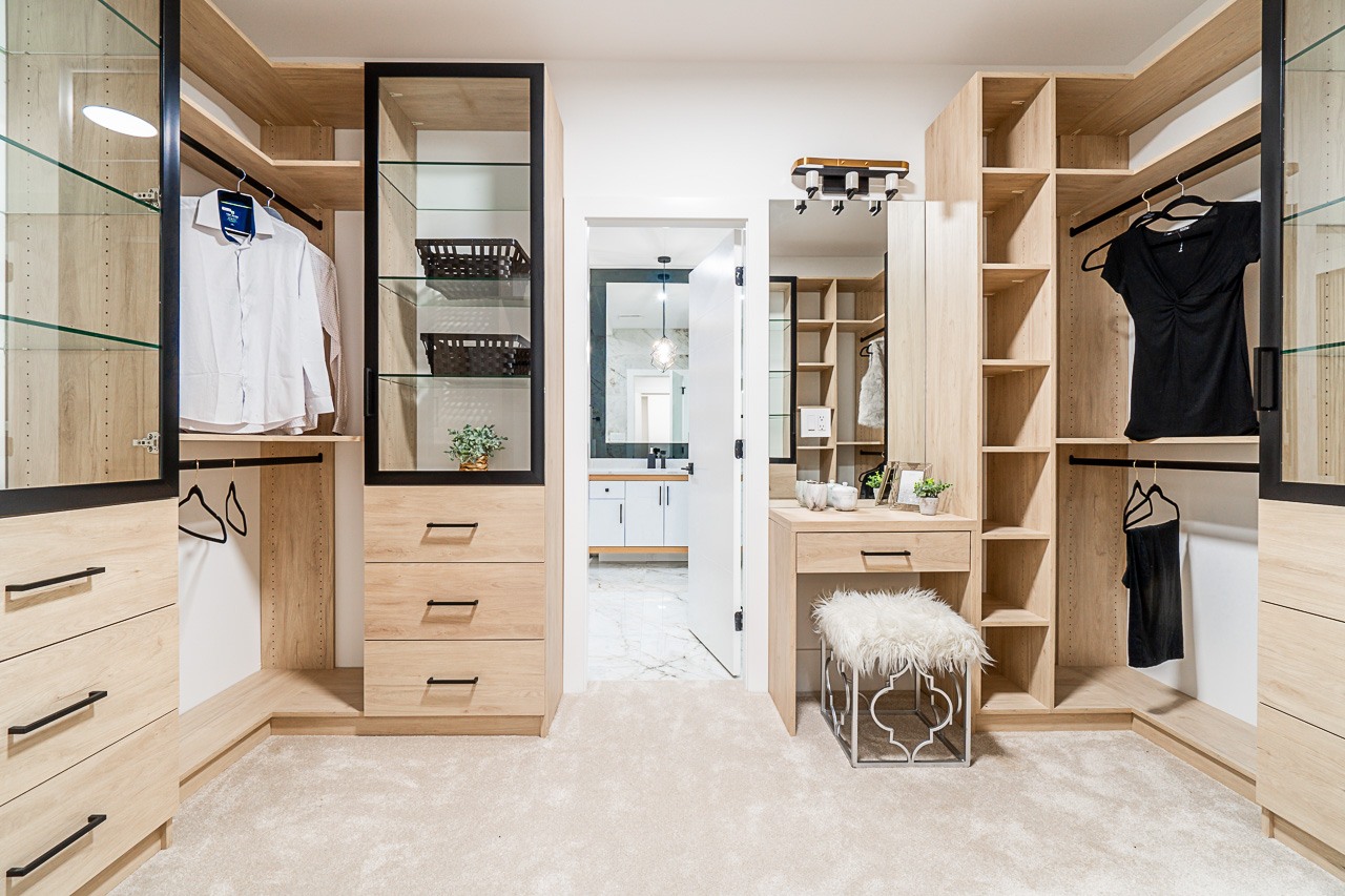Walk-in dressing room with integrated wood shelving